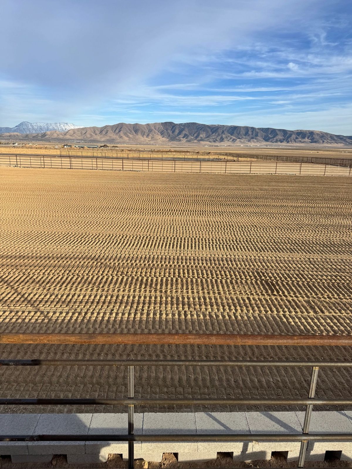 Installed arena with sand and fencing
